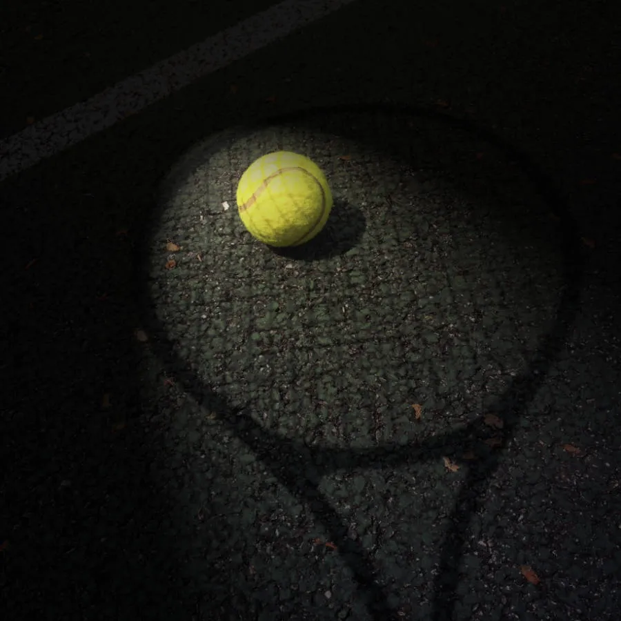 tennis ball on reflection of beacon park tennis court